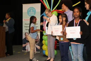 Clifford Davis students turn the page on reading struggles, cheers celebrate happy ending