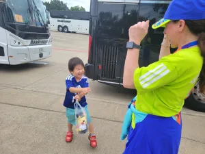 High-fives for transit as workers, volunteers suit up to move masses of soccer fans