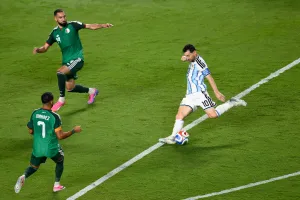 Messi has his first World Cup hat trick as defending champion Argentina beats Algeria 3-0 in opener