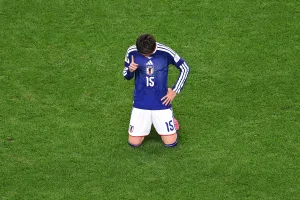 Daichi Kamada's late goal gives Japan a 2-2 draw with the Netherlands in World Cup opener for both