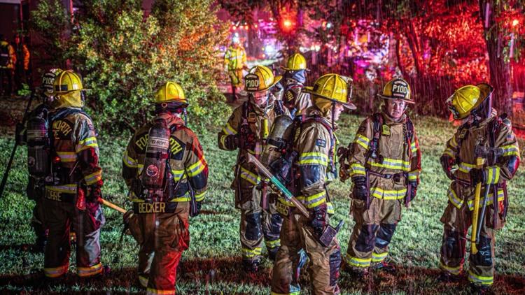 Fort Worth fire crews, rookies tackle house fire in pouring rain